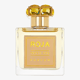 Elegant bottle of Isola Sol Parfum emitting a soft, sunlit glow