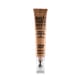 Close-up of the Multi Tasker Concealer & Foundation (60 Light Honey) bottle