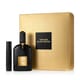 Sleek bottle of Tom Ford Black Orchid Eau de Parfum with mini travel companion
